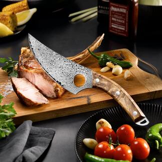 Couteau de boucher damassé Exclusivement chez Pro-Idée : le couteau de boucher avec une lame à 73 couches en acier japonais.