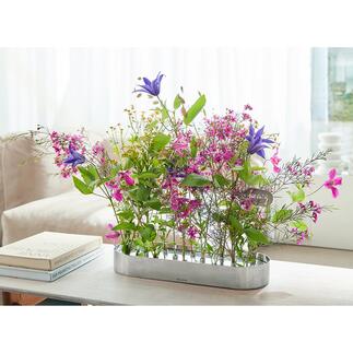 Vase pour fleurs à enficher Avec ce vase en acier inox dans lequel on enfiche les fleurs, vous créez les plus jolis arrangements de fleurs. Conçu par une des plus grandes designers florale suédoise Hanna Wendelbo.