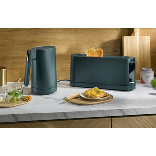 Grille-pain et bouilloire Jacob Jensen sur un comptoir de cuisine.