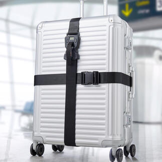 Valise argentée avec ensemble de ceintures de bagages noir 3-en-1 à l'aéroport.