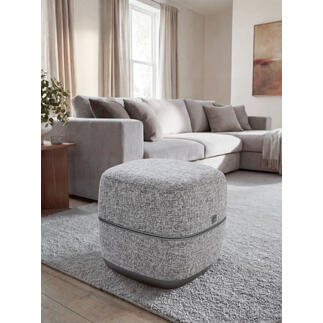 Pouf de massage des pieds au design dans un salon élégant.