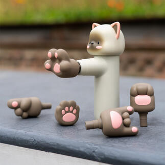 Mini-massageur en forme de lapin avec différents têtes de massage.