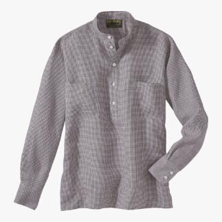 Chemise en lin Nehru grise avec boutonnière et poche plaquée sur fond blanc.