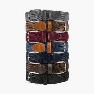 Une pile de différentes ceintures élastiques de différentes couleurs.