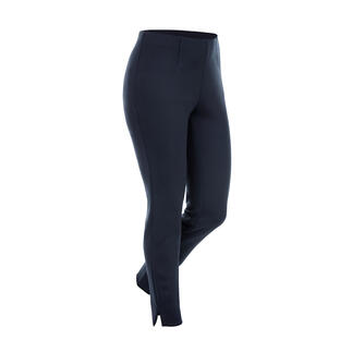 Pantalon pour femmes en noir, coupe étroite avec fentes latérales.