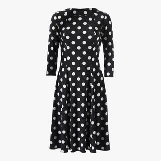 Vue de face d'une robe à pois noire en tissu extensible.
