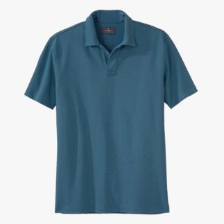Polo Ragman Pima-Pikee bleu foncé, posé sur une table.