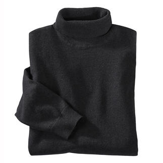 Pull fin noir roulé, plié.