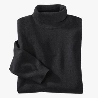 Pull fin noir roulé, plié.