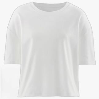 T-shirt boxy en interlock blanc sur un fond blanc.