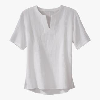 Chemise de plage en musseline blanche avec des manches courtes et un col rond.