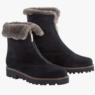 Deux bottes OCONI curling noires sur fond blanc