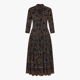 Robe en laine à motif floral sur fond noir, légèrement incliné.