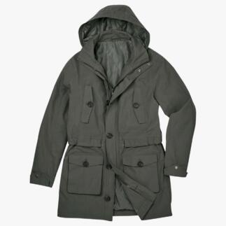 Parka olive avec capuche ouverte sur la table.