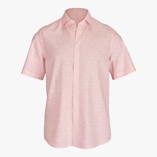 Chemise tropicale rose à manches courtes et coupe boxy.