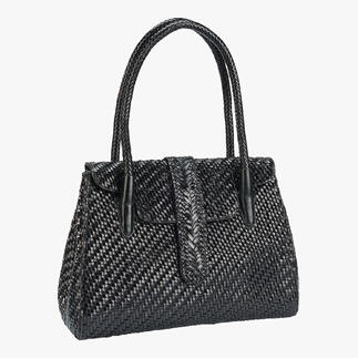 Sac tote en cuir tressé Allan K en noir, debout.