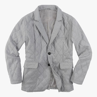 Veste matelassée en cachemire grise sur fond blanc, légèrement ouverte.