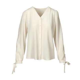 Blouse en coton-cachemire claire à manches longues et liens à nouer.