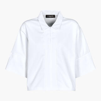 Chemise oversize boxy blanche en taille 36 avec manches courtes.