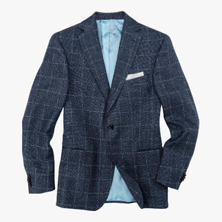 Veste Panama bleue Carl Gross avec doublure grise, drapée de manière décontractée.