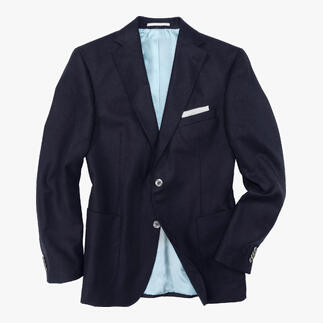 Veste en soie Carl Gross en bleu foncé avec doublure grise, légèrement ouverte.