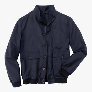 Blouson Storm-System®, le devant montre des boutons et des poches, tissu sombre.