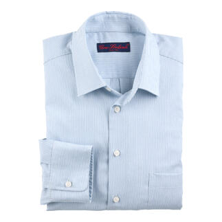 Chemise en merino-soie rayée bleu et écru, pliée.