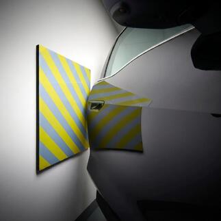 Coussin de mur de garage protégeant le mur de la voiture avec des rayures jaunes.
