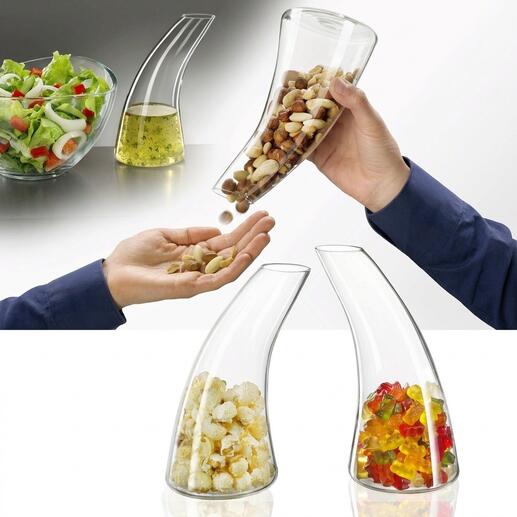 Distributeur de collations en forme de carafe avec des noix et des bonbons.