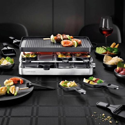 Raclette combinée RC 1400 avec différentes légumes sur la table.