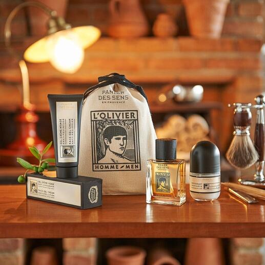 L’Olivier set cadeau avec des produits de soin du visage dans une ambiance rustique.