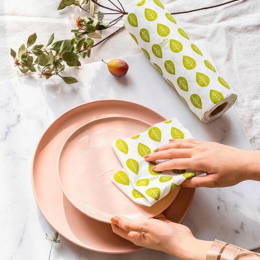 Essuie-tout réutilisable avec design de feuilles vertes sur une table