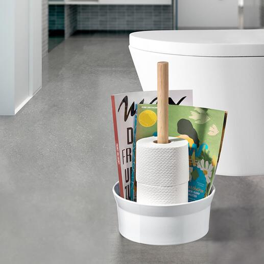 Porte-papier toilette Doublement pratique : pour avoir une réserve de papier toilette et de la lecture.