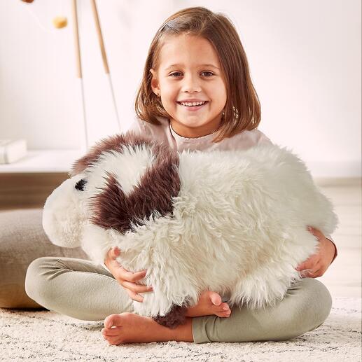Coussin de peau en forme de mouton Un confort douillet : le mouton en laine d’agneau pour quelques heures de repos, de détente et pour réchauffer.