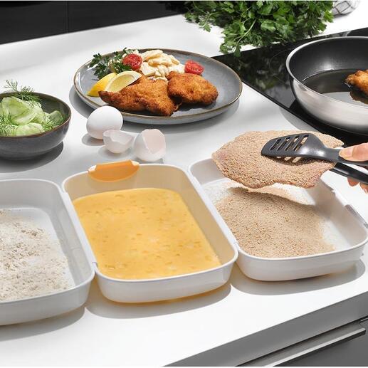 Ensemble de panure de quatre pièces sur un plan de travail de cuisine.