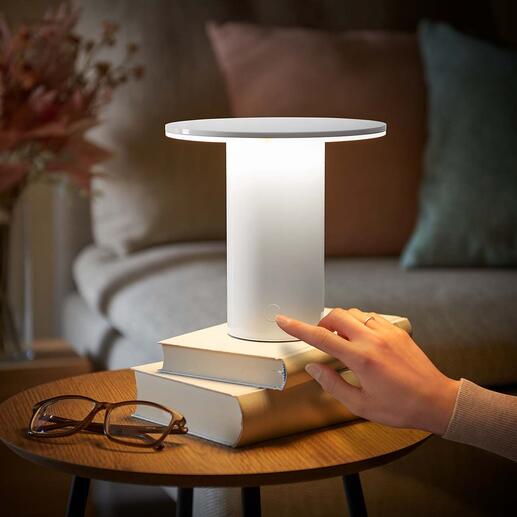 Lampe de table mobile sans fil Blanc pur, design minimaliste : sans doute la forme la plus réduite de lampe d’ambiance noble.