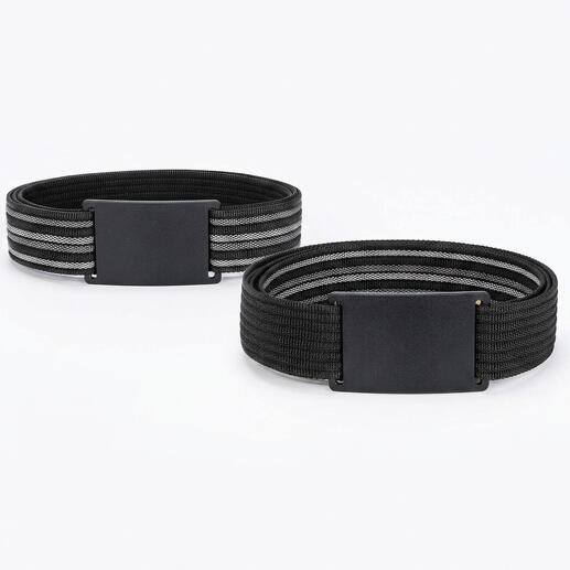 Deux ceintures réversibles cleverbelt Vario en noir et gris sur une table.