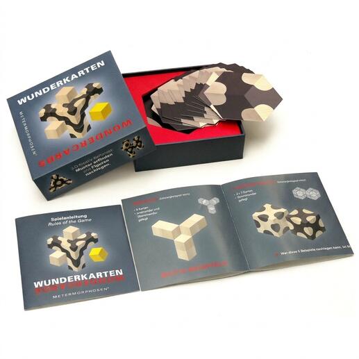 Boîte de jeu Wunderkarten et cartes avec instructions.