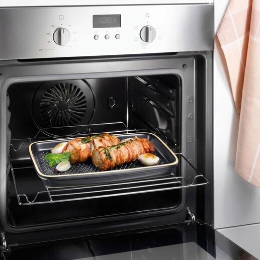 Viande grillée sur une plaque de cuisson RÖMERTOPF® dans le four