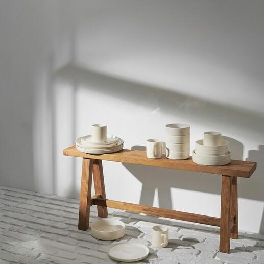 Assiettes Reglaze 6 pièces empilées de manière décorative sur une table en bois.