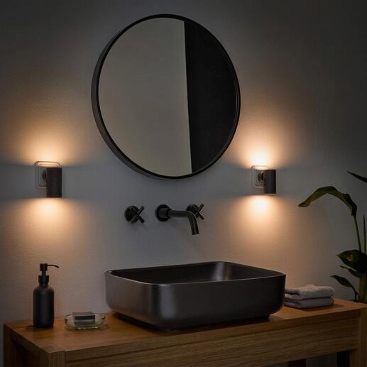 Applique murale dimmable dans un environnement de salle de bain à côté d'un lavabo moderne.