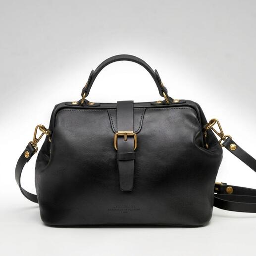 Sac à main noir pour dames en cuir structuré sur fond blanc.