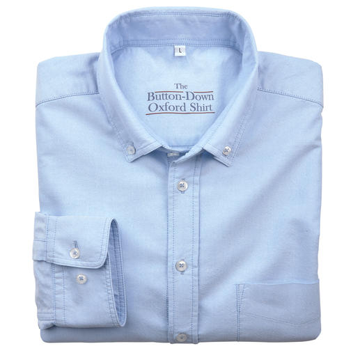 Chemise bleu clair, pliée, taille 38 cm avec col à boutons.