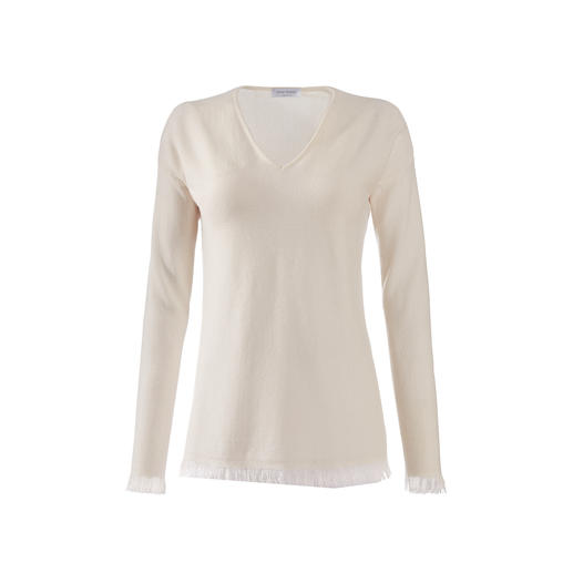 Pull à franges blanc avec col en V.