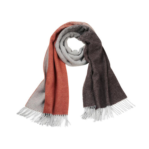 Écharpe jacquard aux teintes rouge et gris sur fond blanc.
