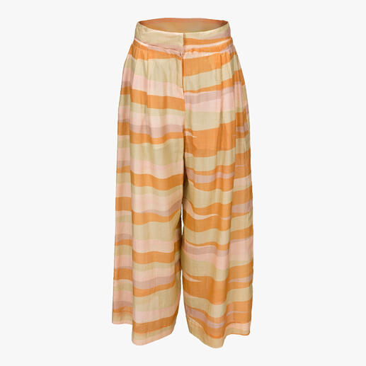 Pantalon avec motif en rose, vanille, moutarde et vert tendre.