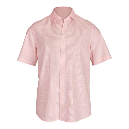 Chemise tropicale rose à manches courtes et coupe boxy.