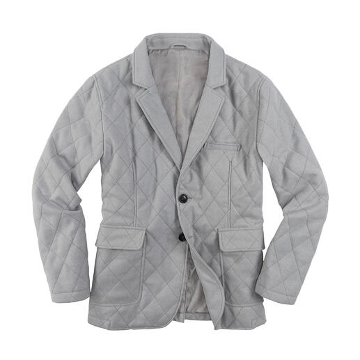 Veste matelassée en cachemire grise sur fond blanc, légèrement ouverte.