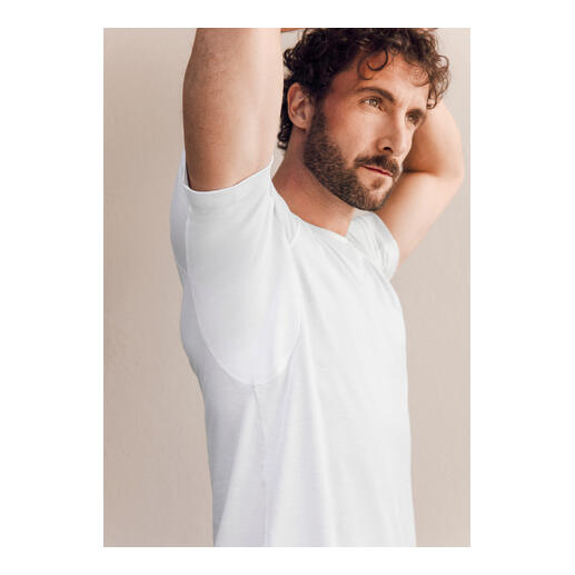 Homme, T-shirt col en V, Blanc Homme portant un T-shirt blanc de FALKE Daily Climate Control, vue de côté.