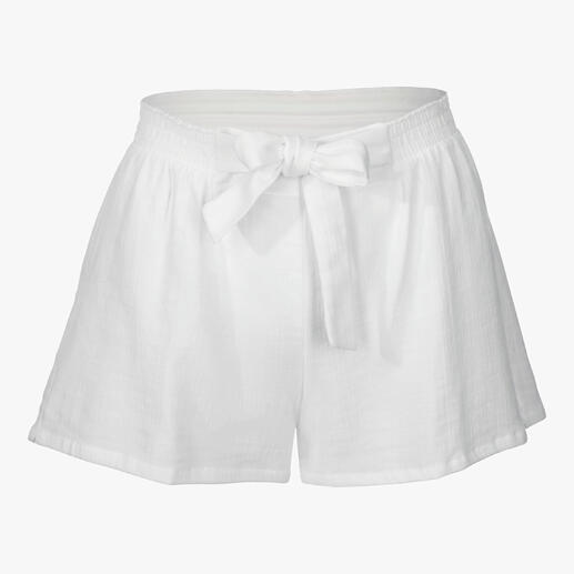 Shorts en mousseline blanche Novila avec un nœud sur fond clair.